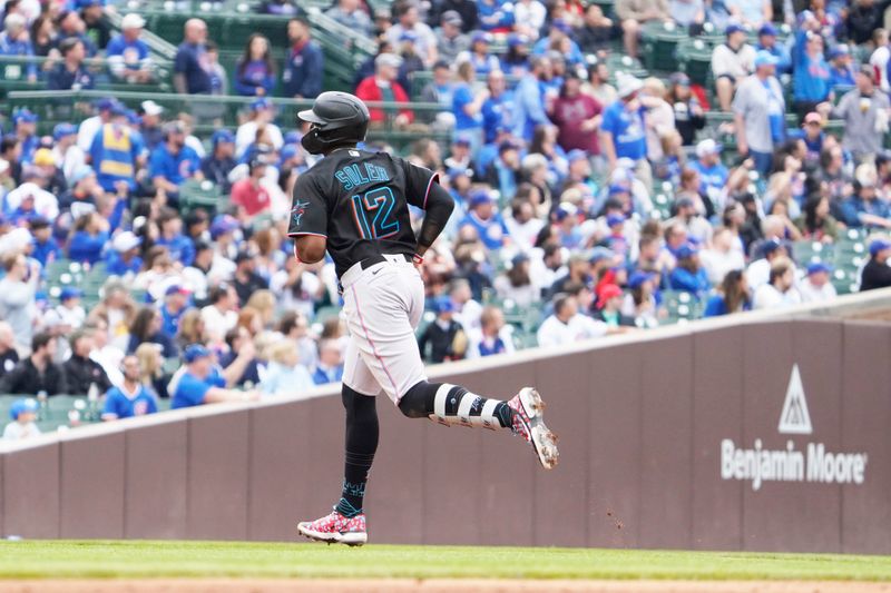 May 6, 2023; Chicago, Illinois, USA; Miami Marlins right fielder Jorge Soler (12) runs the bases after hitting a home run against the Chicago Cubs during the third inning at Wrigley Field. Mandatory Credit: David Banks-USA TODAY Sports