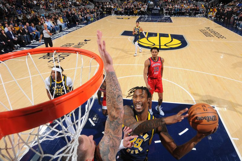 INDIANAPOLIS, IN - NOVEMBER 25: Quenton Jackson #29 of the Indiana Pacers drives to the basket during the game against the New Orleans Pelicans on November 25, 2024 at Gainbridge Fieldhouse in Indianapolis, Indiana. NOTE TO USER: User expressly acknowledges and agrees that, by downloading and or using this Photograph, user is consenting to the terms and conditions of the Getty Images License Agreement. Mandatory Copyright Notice: Copyright 2024 NBAE (Photo by Ron Hoskins/NBAE via Getty Images)
