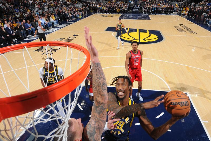 INDIANAPOLIS, IN - NOVEMBER 25: Quenton Jackson #29 of the Indiana Pacers drives to the basket during the game against the New Orleans Pelicans on November 25, 2024 at Gainbridge Fieldhouse in Indianapolis, Indiana. NOTE TO USER: User expressly acknowledges and agrees that, by downloading and or using this Photograph, user is consenting to the terms and conditions of the Getty Images License Agreement. Mandatory Copyright Notice: Copyright 2024 NBAE (Photo by Ron Hoskins/NBAE via Getty Images)