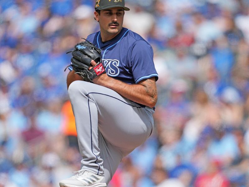 May 18, 2024; Toronto, Ontario, CAN; Tampa Bay Rays starting pitcher Zach Eflin (24) throws a pitch during the first inning against the Toronto Blue Jays at Rogers Centre. Mandatory Credit: Nick Turchiaro-USA TODAY Sports