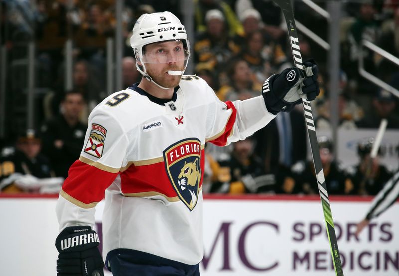 Dec 3, 2024; Pittsburgh, Pennsylvania, USA;  Florida Panthers center Sam Bennett (9) reacts after scoring a goal against the Pittsburgh Penguins during the third period at PPG Paints Arena. Mandatory Credit: Charles LeClaire-Imagn Images