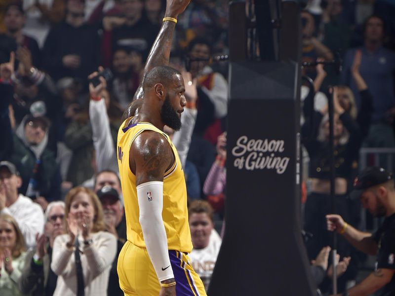 CLEVELAND, OH - DECEMBER 6: LeBron James #6 of the Los Angeles Lakers looks on during the game against the Cleveland Cavaliers on December 6, 2022 at Rocket Mortgage FieldHouse in Cleveland, Ohio. NOTE TO USER: User expressly acknowledges and agrees that, by downloading and/or using this Photograph, user is consenting to the terms and conditions of the Getty Images License Agreement. Mandatory Copyright Notice: Copyright 2022 NBAE (Photo by David Liam Kyle/NBAE via Getty Images)