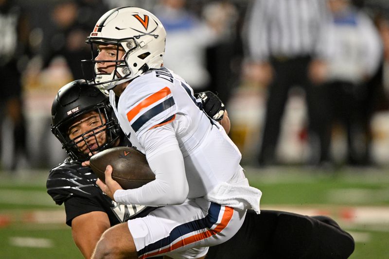 Nov 9, 2023; Louisville, Kentucky, USA; Louisville Cardinals defensive lineman Ashton Gillotte (9) sacks Virginia Cavaliers quarterback Anthony Colandrea (10) during the first quarter at L&N Federal Credit Union Stadium. Mandatory Credit: Jamie Rhodes-USA TODAY Sports