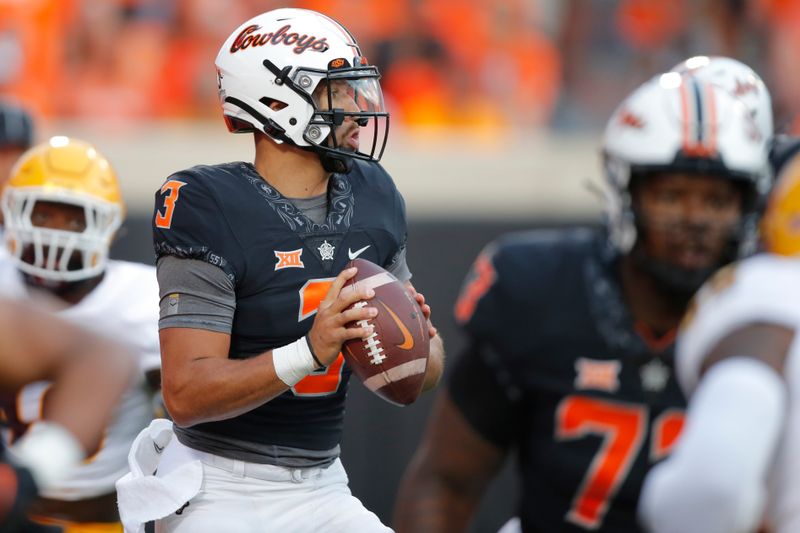 Sep 10, 2022; Stillwater, Oklahoma, USA; Oklahoma State Cowboys quarterback Spencer Sanders (3) drops back to pass against the Arizona State Sun Devils at Boone Pickens Stadium. Mandatory Credit: Bryan Terry-USA TODAY Sports