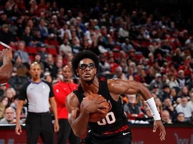 PORTLAND, OR - DECEMBER 14:  Scoot Henderson #00 of the Portland Trail Blazers goes to the basket during the game on December 14, 2023 at the Moda Center Arena in Portland, Oregon. NOTE TO USER: User expressly acknowledges and agrees that, by downloading and or using this photograph, user is consenting to the terms and conditions of the Getty Images License Agreement. Mandatory Copyright Notice: Copyright 2023 NBAE (Photo by Cameron Browne/NBAE via Getty Images)