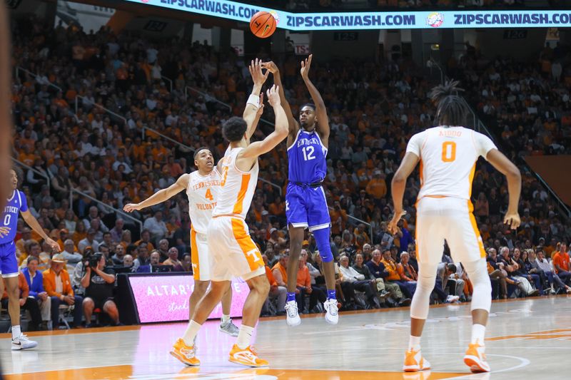 Jan 14, 2023; Knoxville, Tennessee, USA; Kentucky Wildcats guard Antonio Reeves (12) shoots the ball against the Tennessee Volunteers during the second half at Thompson-Boling Arena. Mandatory Credit: Randy Sartin-USA TODAY Sports