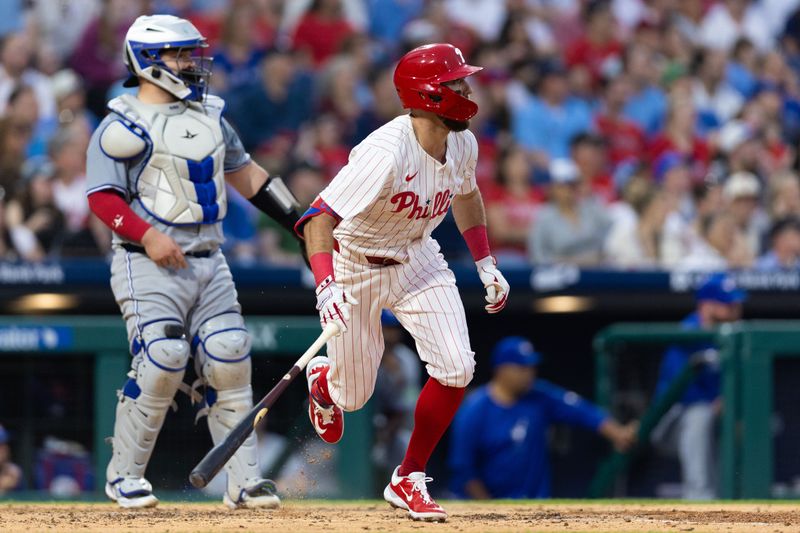 May 7, 2024; Philadelphia, Pennsylvania, USA; Philadelphia Phillies first base Kody Clemens (2) hits an RBI triple during the fourth inning against the Toronto Blue Jays at Citizens Bank Park. Mandatory Credit: Bill Streicher-USA TODAY Sports