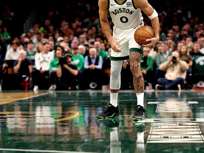 BOSTON, MASSACHUSETTS - NOVEMBER 10: Jayson Tatum #0 of the Boston Celtics looks for an open teammate during the first quarter of their In-Season Tournament game against the Brooklyn Nets at TD Garden on November 10, 2023 in Boston, Massachusetts. NOTE TO USER: User expressly acknowledges and agrees that, by downloading and or using this photograph, User is consenting to the terms and conditions of the Getty Images License Agreement. (Photo by Maddie Meyer/Getty Images)