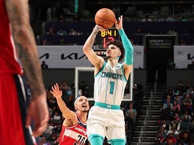 CHARLOTTE, NC - NOVEMBER 22: LaMelo Ball #1 of the Charlotte Hornets shoots a three point basket against the Washington Wizards on November 22, 2023 at Spectrum Center in Charlotte, North Carolina. NOTE TO USER: User expressly acknowledges and agrees that, by downloading and or using this photograph, User is consenting to the terms and conditions of the Getty Images License Agreement. Mandatory Copyright Notice: Copyright 2023 NBAE (Photo by Kent Smith/NBAE via Getty Images)