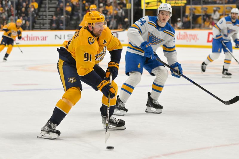 Dec 11, 2025; Nashville, Tennessee, USA;  Nashville Predators center Steven Stamkos (91) skates with the puck against the St. Louis Blues during the first period at Bridgestone Arena. Mandatory Credit: Steve Roberts-Imagn Images