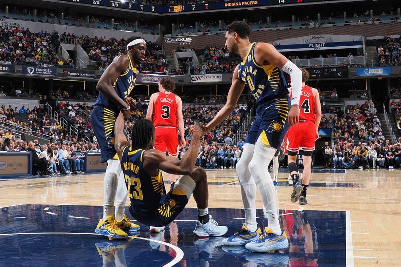 INDIANAPOLIS, IN - MARCH 2: Aaron Nesmith #23 of the Indiana Pacers helped off the floor during the game against the Chicago Bulls on March 2, 2025 at Gainbridge Fieldhouse in Indianapolis, Indiana. NOTE TO USER: User expressly acknowledges and agrees that, by downloading and or using this Photograph, user is consenting to the terms and conditions of the Getty Images License Agreement. Mandatory Copyright Notice: Copyright 2025 NBAE (Photo by Ron Hoskins/NBAE via Getty Images)