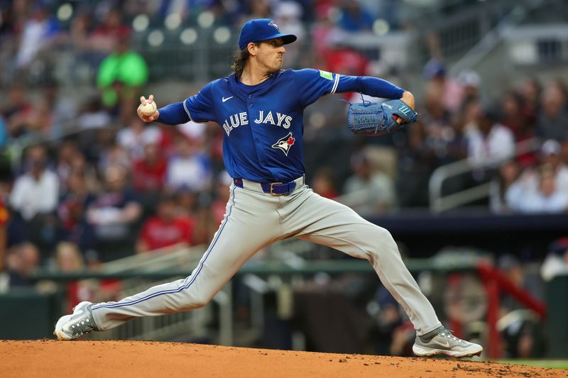 Sep 6, 2024; Atlanta, Georgia, USA; Toronto Blue Jays starting pitcher Kevin Gausman (34) throws against the Atlanta Braves in the first inning at Truist Park. Mandatory Credit: Brett Davis-Imagn Images