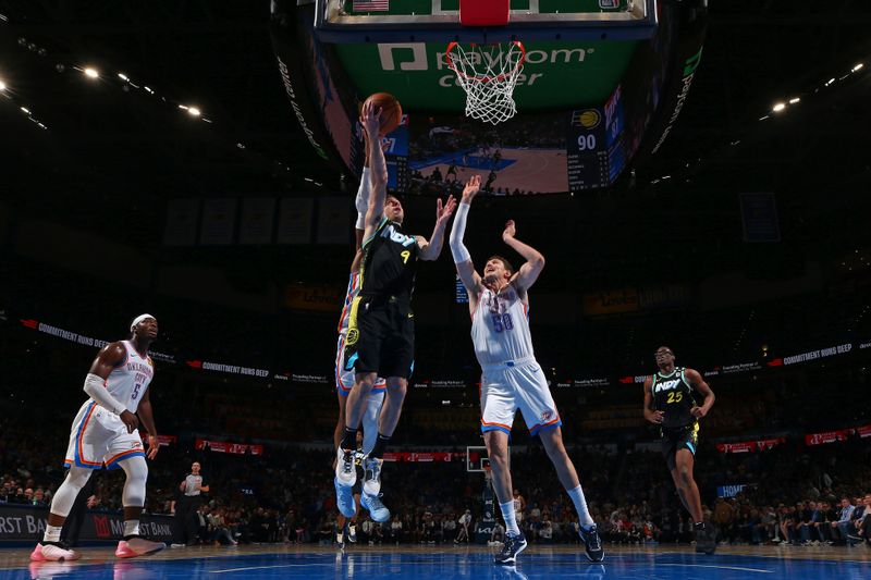 OKLAHOMA CITY, OK - MARCH 12: T.J. McConnell #9 of the Indiana Pacers drives to the basket during the game against the Oklahoma City Thunder on March 12, 2024 at Paycom Arena in Oklahoma City, Oklahoma. NOTE TO USER: User expressly acknowledges and agrees that, by downloading and or using this photograph, User is consenting to the terms and conditions of the Getty Images License Agreement. Mandatory Copyright Notice: Copyright 2024 NBAE (Photo by Zach Beeker/NBAE via Getty Images)