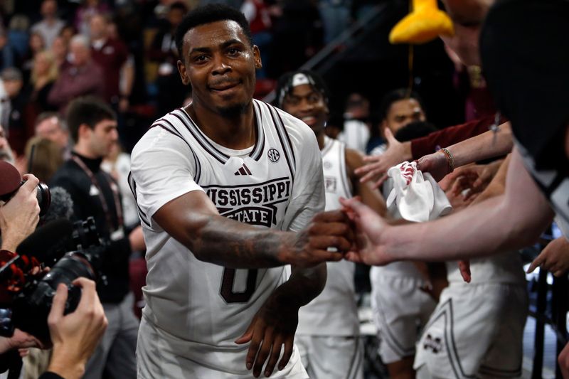 Jan 27, 2024; Starkville, Mississippi, USA; Mississippi State Bulldogs forward D.J. Jeffries (0) reacts with fans after defeating the Auburn Tigers at Humphrey Coliseum. Mandatory Credit: Petre Thomas-USA TODAY Sports