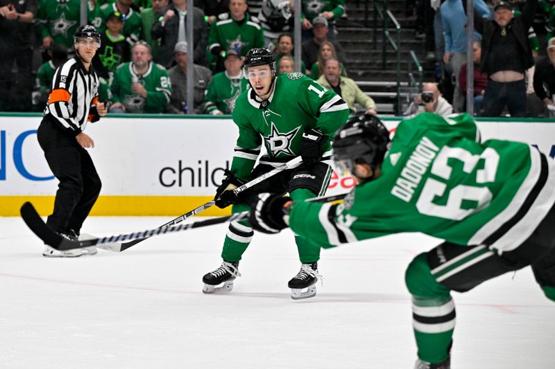 May 1, 2024; Dallas, Texas, USA; Dallas Stars right wing Evgenii Dadonov (63) shoots the puck on a pass from center Logan Stankoven (11) during the second period against the Vegas Golden Knights in game five of the first round of the 2024 Stanley Cup Playoffs at the American Airlines Center. Mandatory Credit: Jerome Miron-USA TODAY Sports