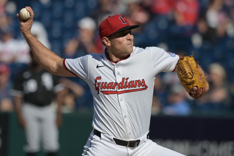 Sep 14, 2025; Cleveland, Ohio, USA; Cleveland Guardians relief pitcher Cade Smith (36) throws a pitch against the Chicago White Sox during the ninth inning at Progressive Field. Mandatory Credit: Ken Blaze-Imagn Images