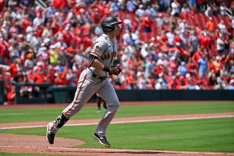 Jun 14, 2023; St. Louis, Missouri, USA;  San Francisco Giants center fielder Mike Yastrzemski (5) hits a game tying two run home run against the St. Louis Cardinals during the ninth inning at Busch Stadium. Mandatory Credit: Jeff Curry-USA TODAY Sports