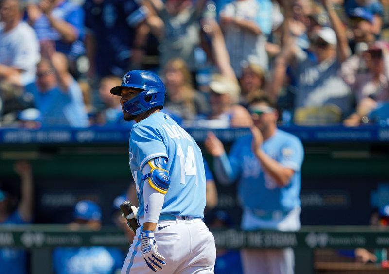 May 28, 2023; Kansas City, Missouri, USA; Kansas City Royals left fielder Edward Olivares (14) watches after hitting a home run during the eighth inning against the Washington Nationals at Kauffman Stadium. Mandatory Credit: Jay Biggerstaff-USA TODAY Sports