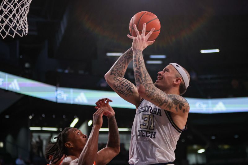 Mar 4, 2025; Atlanta, Georgia, USA; Georgia Tech Yellow Jackets forward Duncan Powell (31) shoots against the Miami Hurricanes in the second half at McCamish Pavilion. Mandatory Credit: Brett Davis-Imagn Images