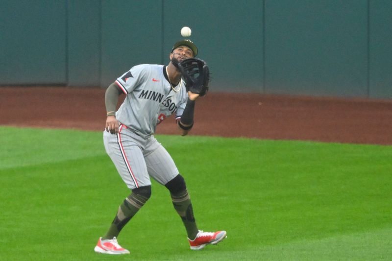 May 17, 2024; Cleveland, Ohio, USA; Minnesota Twins center fielder Willi Castro (50) makes a catch in the third inning against the Cleveland Guardians at Progressive Field. Mandatory Credit: David Richard-USA TODAY Sports