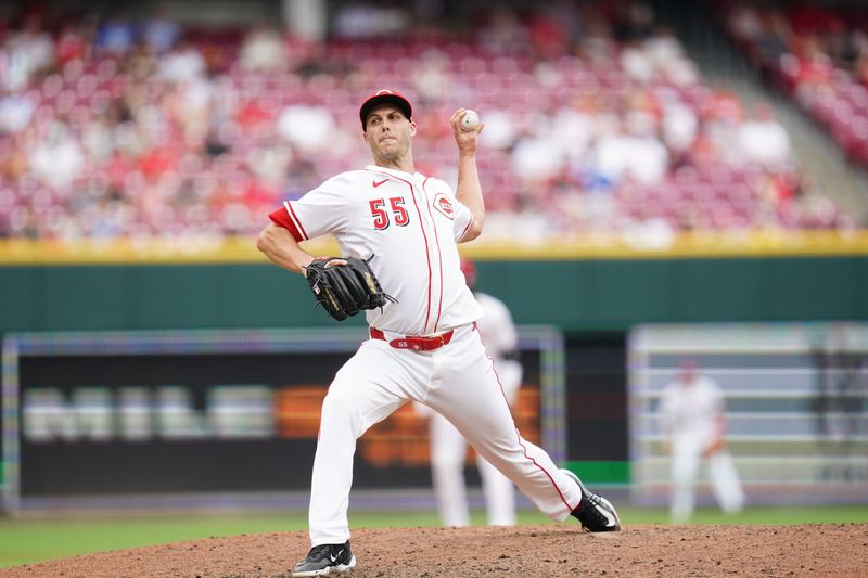 Jun 29, 2025; Cincinnati, Ohio, USA; Cincinnati Reds pitcher Taylor Rogers (55) throws a pitch in the eighth inning the San Diego Padres at Great American Ball Park. Mandatory Credit: Frank Bowen IV/ The USAToday Network via Imagn Images