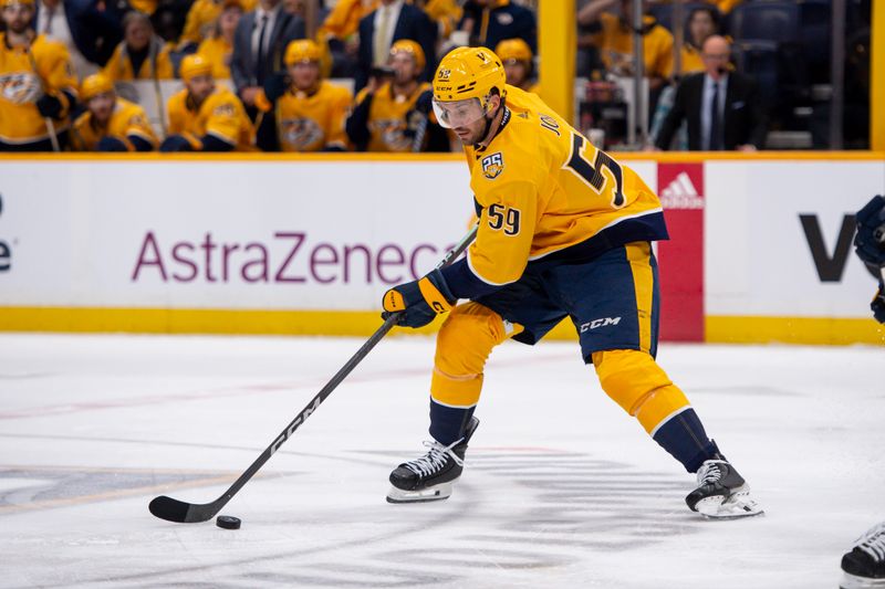 Apr 26, 2024; Nashville, Tennessee, USA; Nashville Predators defenseman Roman Josi (59) skates against the Vancouver Canucks during the third period in game three of the first round of the 2024 Stanley Cup Playoffs at Bridgestone Arena. Mandatory Credit: Steve Roberts-USA TODAY Sports