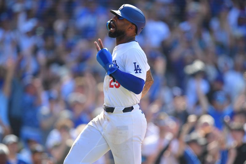 May 19, 2024; Los Angeles, California, USA; Los Angeles Dodgers right fielder Jason Heyward (23) reacts after scoring the winning run against the Cincinnati Reds during the tenth inning at Dodger Stadium. Mandatory Credit: Gary A. Vasquez-USA TODAY Sports