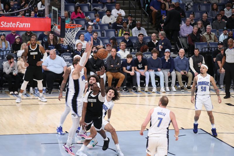 MEMPHIS, TN - JANUARY 26:  Vince Williams Jr. #5 of the Memphis Grizzlies drives to the basket during the game against the Orlando Magic on January 26, 2024 at FedExForum in Memphis, Tennessee. NOTE TO USER: User expressly acknowledges and agrees that, by downloading and or using this photograph, User is consenting to the terms and conditions of the Getty Images License Agreement. Mandatory Copyright Notice: Copyright 2024 NBAE (Photo by Joe Murphy/NBAE via Getty Images)