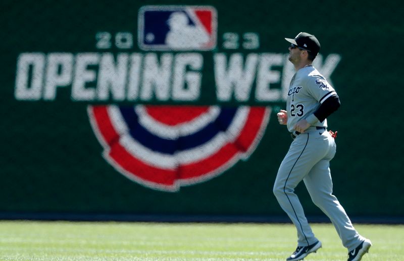 Apr 9, 2023; Pittsburgh, Pennsylvania, USA;  Chicago White Sox left fielder Andrew Benintendi (23) warms up in the outfield before the game against the Pittsburgh Pirates at PNC Park. Mandatory Credit: Charles LeClaire-USA TODAY Sports