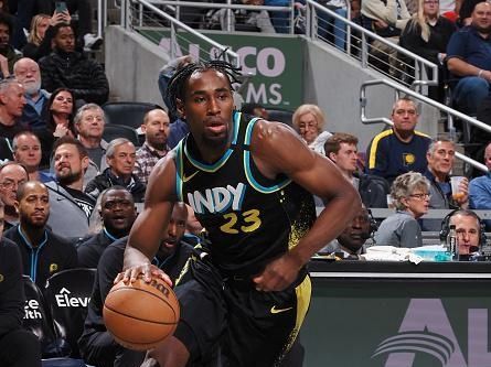 INDIANAPOLIS, IN - DECEMBER 20: Aaron Nesmith #23 of the Indiana Pacers drives to the basket during the game against the Charlotte Hornets on December 20, 2023 at Gainbridge Fieldhouse in Indianapolis, Indiana. NOTE TO USER: User expressly acknowledges and agrees that, by downloading and or using this Photograph, user is consenting to the terms and conditions of the Getty Images License Agreement. Mandatory Copyright Notice: Copyright 2023 NBAE (Photo by Ron Hoskins/NBAE via Getty Images)