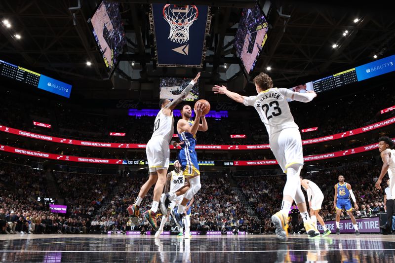 SALT LAKE CITY, UT - FEBRUARY 15: Stephen Curry #30 of the Golden State Warriors drives to the basket during the game against the Utah Jazz on February 15, 2024 at Delta Center in Salt Lake City, Utah. NOTE TO USER: User expressly acknowledges and agrees that, by downloading and or using this Photograph, User is consenting to the terms and conditions of the Getty Images License Agreement. Mandatory Copyright Notice: Copyright 2024 NBAE (Photo by Melissa Majchrzak/NBAE via Getty Images)