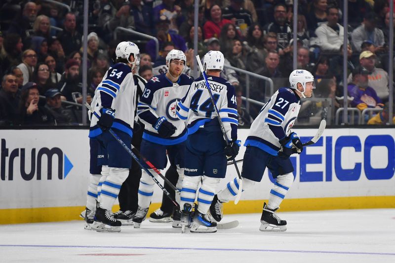 Dec 13, 2023; Los Angeles, California, USA; Winnipeg Jets left wing Nikolaj Ehlers (27) celebrates his goal scored against the Los Angeles Kings during the second period at Crypto.com Arena. Mandatory Credit: Gary A. Vasquez-USA TODAY Sports