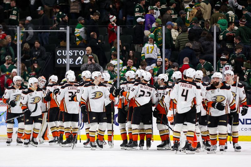 Jan 27, 2024; Saint Paul, Minnesota, USA; Anaheim Ducks players celebrate the win against the Minnesota Wild after the game at Xcel Energy Center. Mandatory Credit: Matt Krohn-USA TODAY Sports