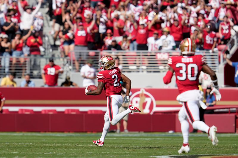 San Francisco 49ers' Deommodore Lenoir (2) returns a blocked field goal for a touchdown during the first half of an NFL football game against the Arizona Cardinals in Santa Clara, Calif., Sunday, Oct. 6, 2024. (AP Photo/Godofredo A. Vásquez)