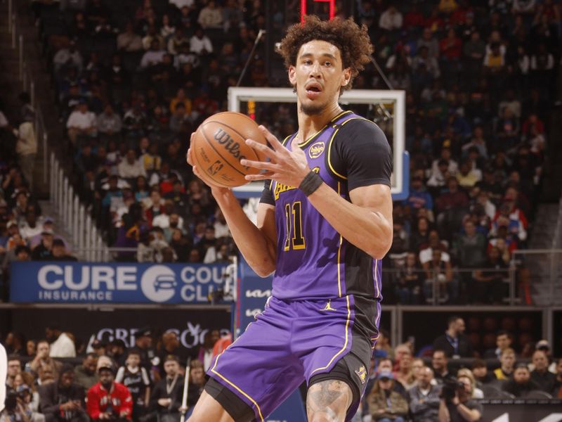 DETROIT, MI - NOVEMBER 4: Jaxson Hayes #11 of the Los Angeles Lakers looks to pass the ball during the game against the Detroit Pistons on November 4, 2024 at Little Caesars Arena in Detroit, Michigan. NOTE TO USER: User expressly acknowledges and agrees that, by downloading and/or using this photograph, User is consenting to the terms and conditions of the Getty Images License Agreement. Mandatory Copyright Notice: Copyright 2024 NBAE (Photo by Brian Sevald/NBAE via Getty Images)