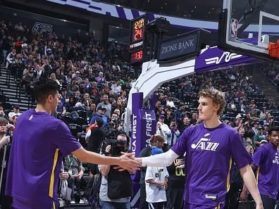 SALT LAKE CITY, UT - DECEMBER 13:  Lauri Markkanen #23 of the Utah Jazz & Simone Fontecchio #16 of the Utah Jazz high five before the game during player introductions on December 13, 2023 at vivint.SmartHome Arena in Salt Lake City, Utah. NOTE TO USER: User expressly acknowledges and agrees that, by downloading and or using this Photograph, User is consenting to the terms and conditions of the Getty Images License Agreement. Mandatory Copyright Notice: Copyright 2023 NBAE (Photo by Melissa Majchrzak/NBAE via Getty Images)