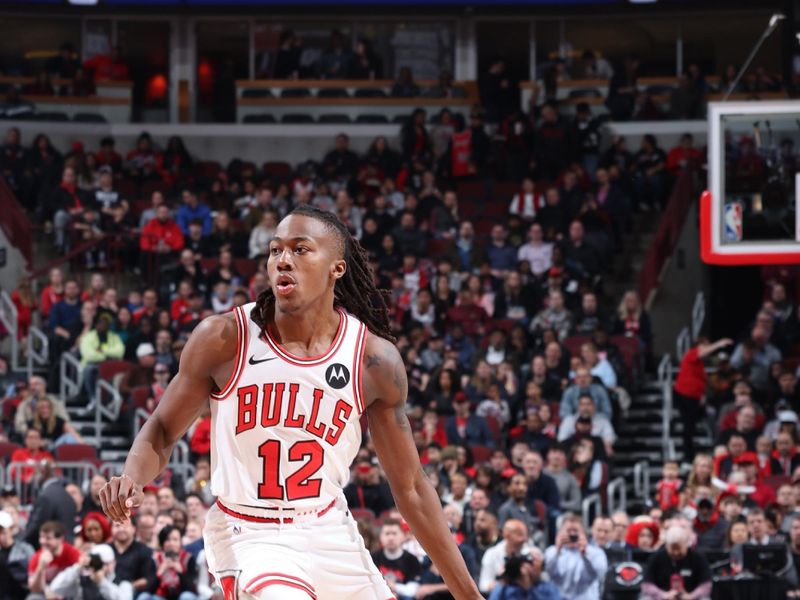 CHICAGO, IL - MARCH 27: Ayo Dosunmu #12 of the Chicago Bulls drives to the basket during the game against the Indiana Pacers on March 27, 2024 at United Center in Chicago, Illinois. NOTE TO USER: User expressly acknowledges and agrees that, by downloading and or using this photograph, User is consenting to the terms and conditions of the Getty Images License Agreement. Mandatory Copyright Notice: Copyright 2024 NBAE (Photo by Jeff Haynes/NBAE via Getty Images)<p><br/></p>