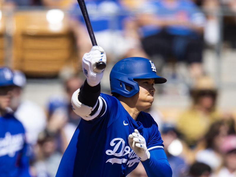 Mar 3, 2024; Phoenix, Arizona, USA; Los Angeles Dodgers designated hitter Shohei Ohtani against the Colorado Rockies during a spring training game at Camelback Ranch-Glendale. Mandatory Credit: Mark J. Rebilas-USA TODAY Sports