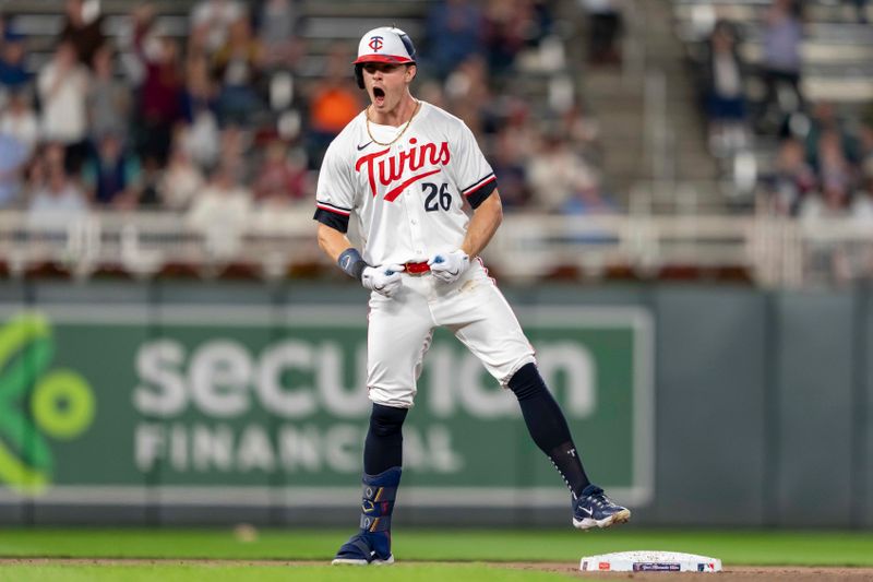 May 8, 2024; Minneapolis, Minnesota, USA; Minnesota Twins right fielder Max Kepler (26) celebrates after hitting an RHI double against the Seattle Mariners in the eighth inning at Target Field. Mandatory Credit: Jesse Johnson-USA TODAY Sports