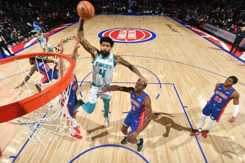 DETROIT, MI - JANUARY 24: Nick Richards #4 of the Charlotte Hornets drives to the basket during the game against the Detroit Pistons on January 24, 2024 at Little Caesars Arena in Detroit, Michigan. NOTE TO USER: User expressly acknowledges and agrees that, by downloading and/or using this photograph, User is consenting to the terms and conditions of the Getty Images License Agreement. Mandatory Copyright Notice: Copyright 2024 NBAE (Photo by Chris Schwegler/NBAE via Getty Images)