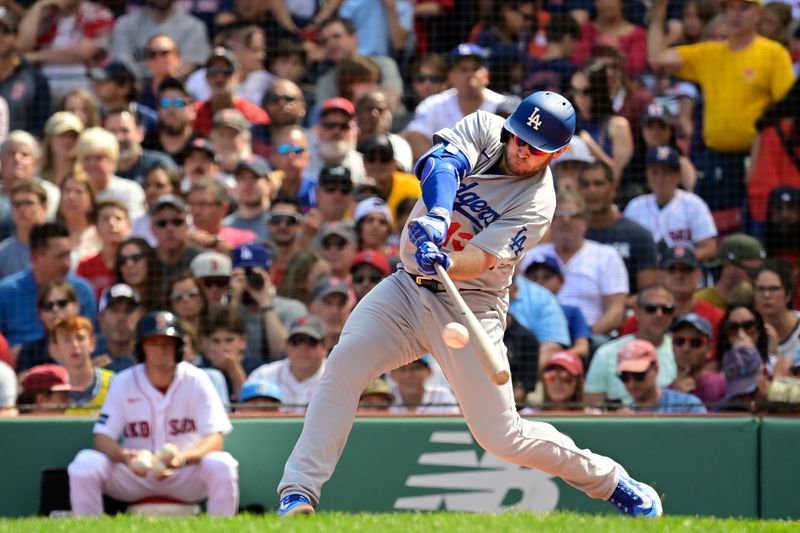 Aug 27, 2023; Boston, Massachusetts, USA; Los Angeles Dodgers third baseman Max Muncy (13) hits a double against the Boston Red Sox during the third inning at Fenway Park. Mandatory Credit: Eric Canha-USA TODAY Sports