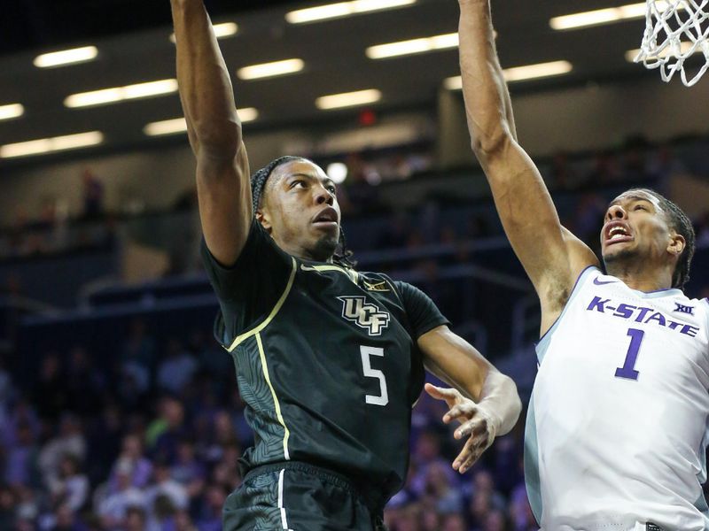 Jan 6, 2024; Manhattan, Kansas, USA; UCF Knights forward Omar Payne (5) goes to the basket against Kansas State Wildcats forward David N'Guessan (1) during the second half at Bramlage Coliseum. Mandatory Credit: Scott Sewell-USA TODAY Sports