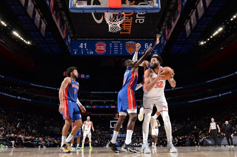 DETROIT, MI - NOVEMBER 1: Karl-Anthony Towns #32 of the New York Knicks drives to the basket during the game against the Detroit Pistons on November 1, 2024 at Little Caesars Arena in Detroit, Michigan. NOTE TO USER: User expressly acknowledges and agrees that, by downloading and/or using this photograph, User is consenting to the terms and conditions of the Getty Images License Agreement. Mandatory Copyright Notice: Copyright 2024 NBAE (Photo by Chris Schwegler/NBAE via Getty Images)