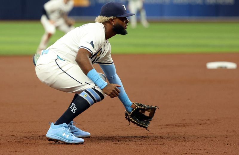 Aug 14, 2024; St. Petersburg, Florida, USA;  Tampa Bay Rays third baseman Junior Caminero (13) looks on against the Houston Astros during the second inning at Tropicana Field. Mandatory Credit: Kim Klement Neitzel-USA TODAY Sports