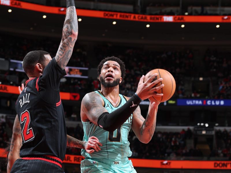 CHICAGO, IL - DECEMBER 13: Miles Bridges #0 of the Charlotte Hornets drives to the basket during the game against the Chicago Bulls on December 13, 2024 at United Center in Chicago, Illinois. NOTE TO USER: User expressly acknowledges and agrees that, by downloading and or using this photograph, User is consenting to the terms and conditions of the Getty Images License Agreement. Mandatory Copyright Notice: Copyright 2024 NBAE (Photo by Jeff Haynes/NBAE via Getty Images)