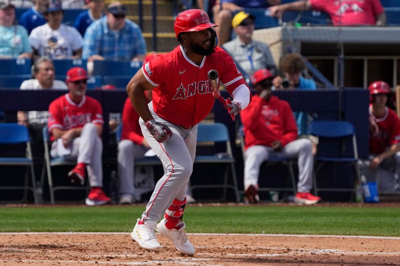 Mar 18, 2024; Phoenix, Arizona, USA; Los Angeles Angels second baseman Luis Rengifo (2) hits a single against the Milwaukee Brewers in the third inning at American Family Fields of Phoenix. Mandatory Credit: Rick Scuteri-USA TODAY Sports