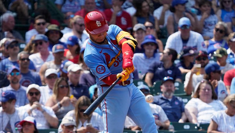 Aug 3, 2024; Chicago, Illinois, USA; St. Louis Cardinals catcher Willson Contreras (40) hits a single against the Chicago Cubs during the sixth inning at Wrigley Field. Mandatory Credit: David Banks-USA TODAY Sports