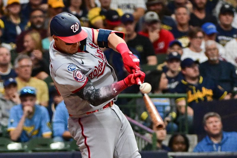 Sep 16, 2023; Milwaukee, Wisconsin, USA;  Washington Nationals designated hitter Joey Meneses (45) drives in a run with a base hit in the sixth inning against the Milwaukee Brewers at American Family Field. Mandatory Credit: Benny Sieu-USA TODAY Sports