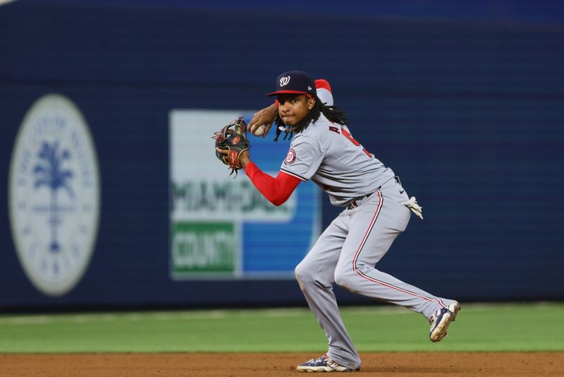 Sep 4, 2024; Miami, Florida, USA; Washington Nationals shortstop CJ Abrams (5) throws to first base to retire Miami Marlins first baseman Jake Burger (not pictured) during the fifth inning at loanDepot Park. Mandatory Credit: Sam Navarro-Imagn Images