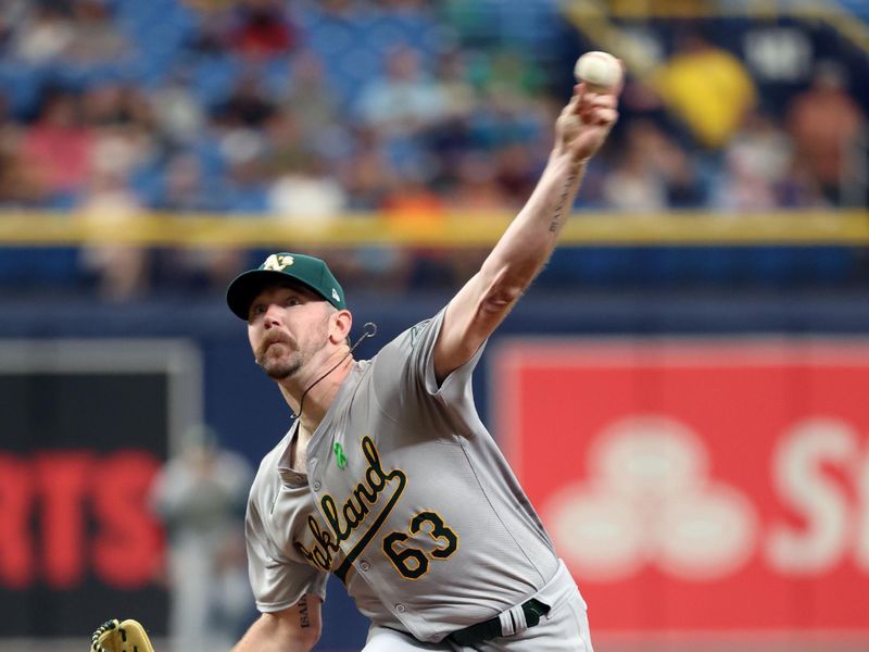 May 30, 2024; St. Petersburg, Florida, USA; Oakland Athletics starting pitcher Hogan Hassis (63) throws a pitch against the Tampa Bay Rays during the first inning at Tropicana Field. Mandatory Credit: Kim Klement Neitzel-USA TODAY Sports